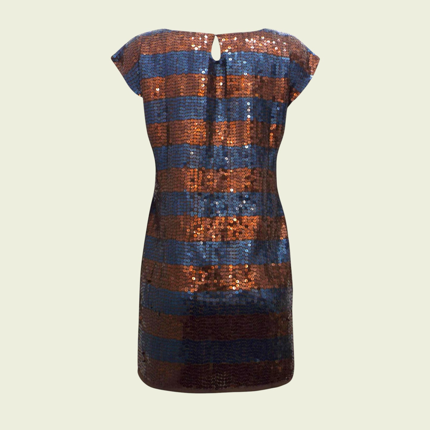 Sequined dress with blue and brown stripes on a beige background