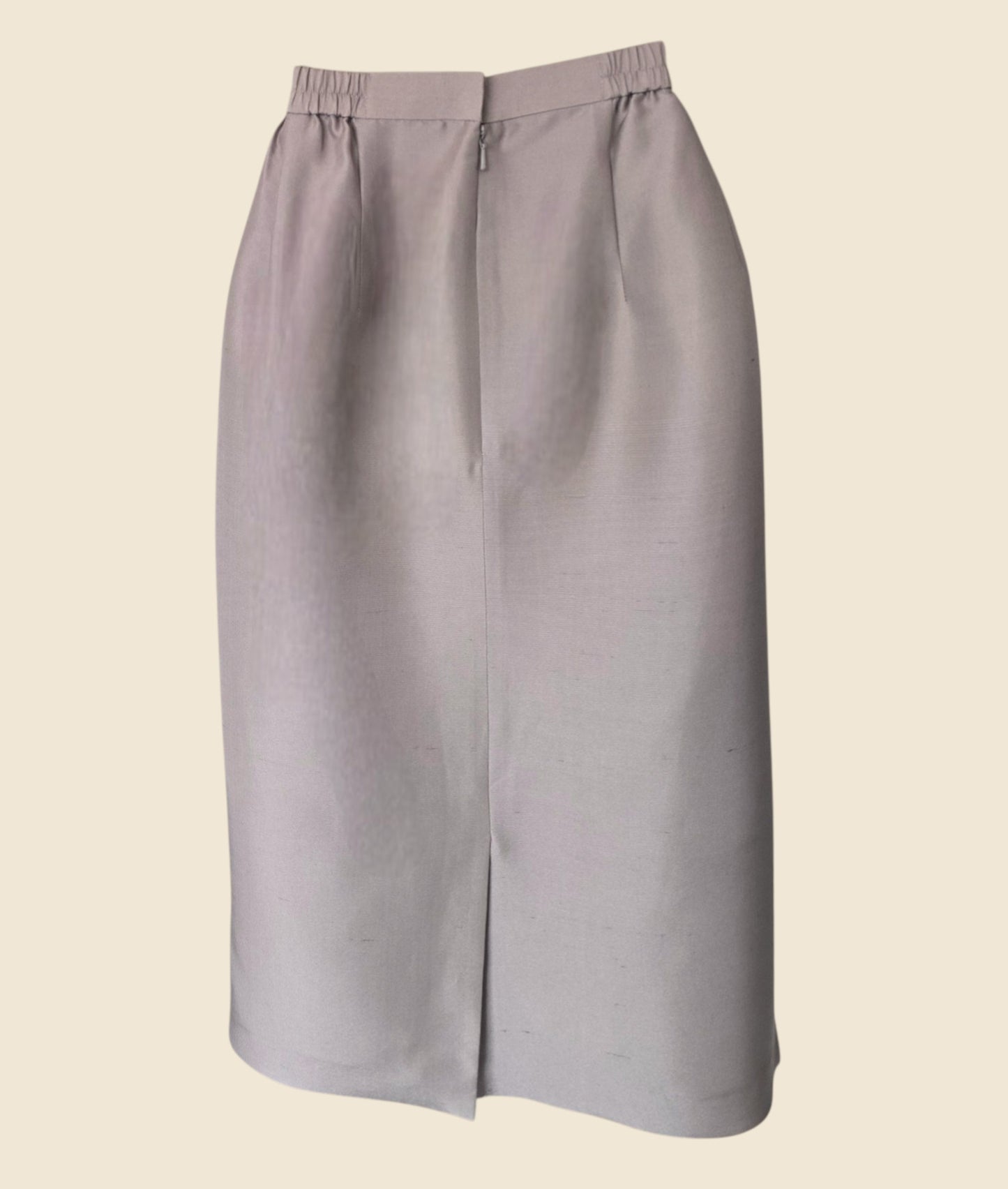 Gray skirt on a beige background