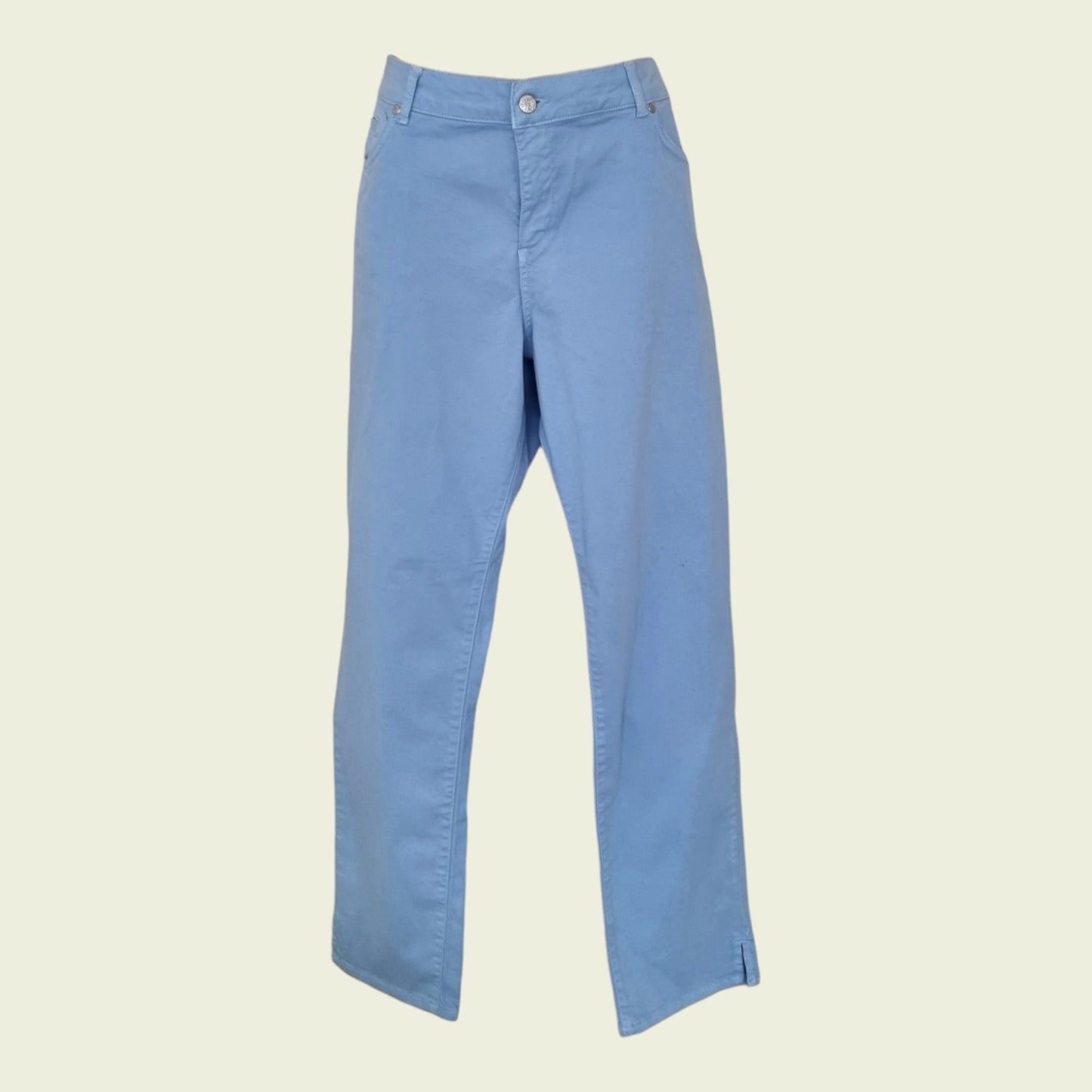 Light blue pants on a beige background