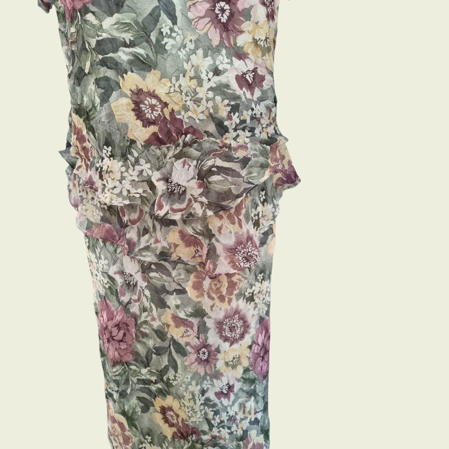 Floral patterned fabric on a beige background