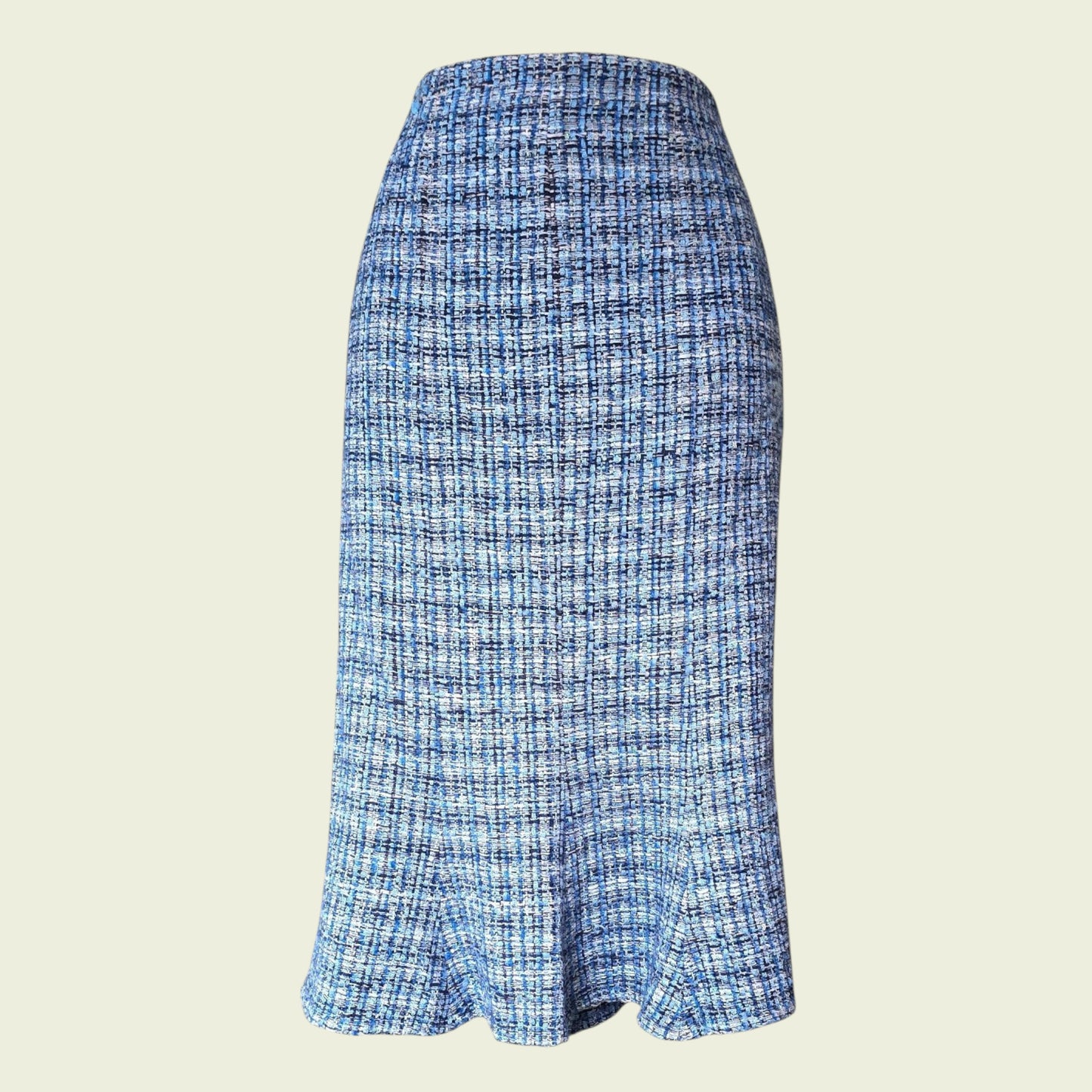 Blue plaid skirt on a beige background