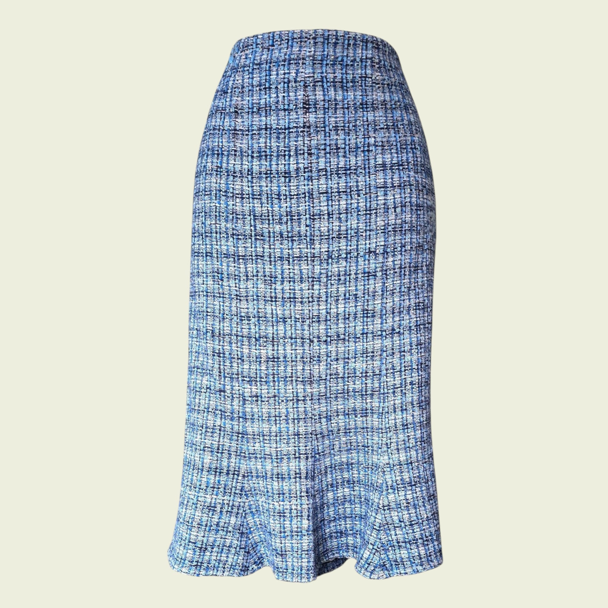 Blue plaid skirt on a beige background