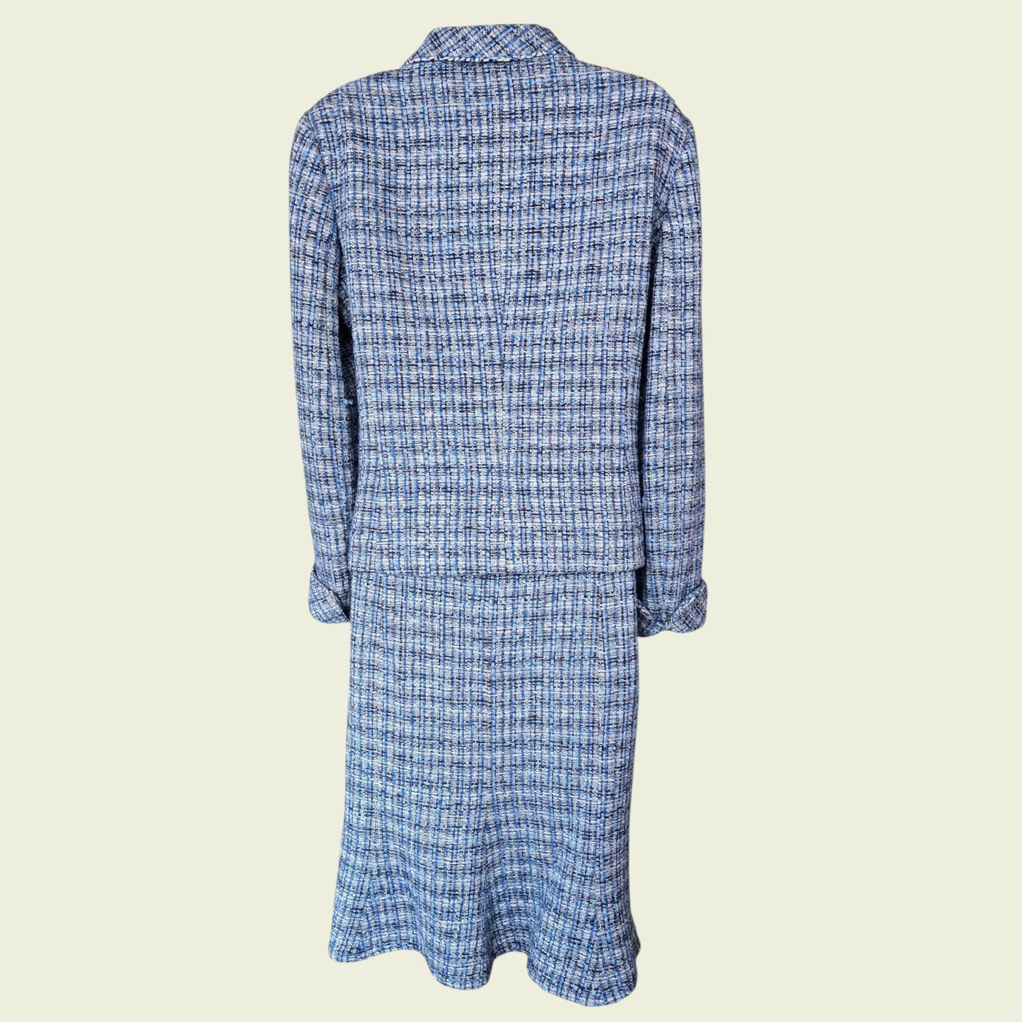 Blue checkered skirt and jacket  on a beige background