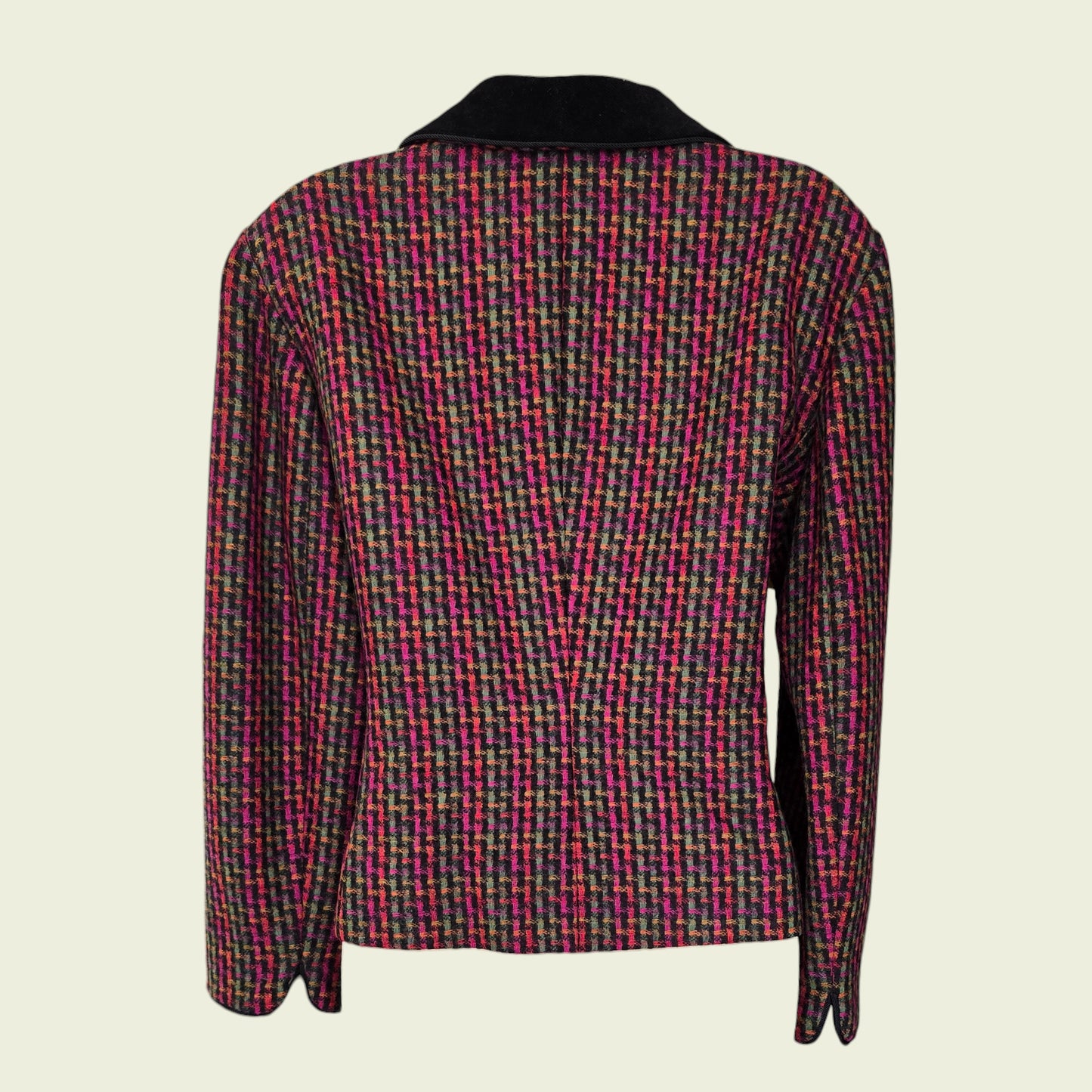 Multicolored patterned jacket on a beige background