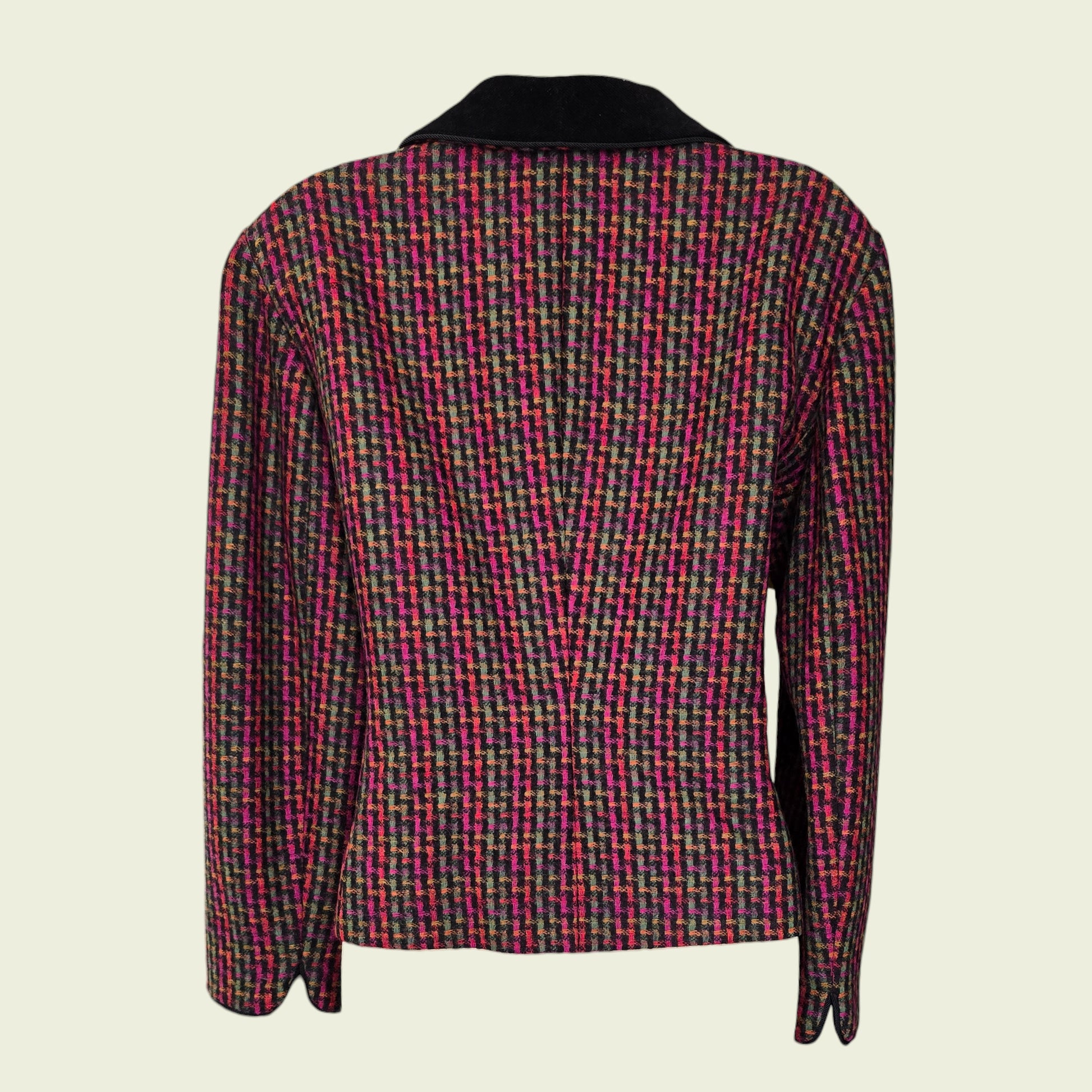 Multicolored patterned jacket on a beige background