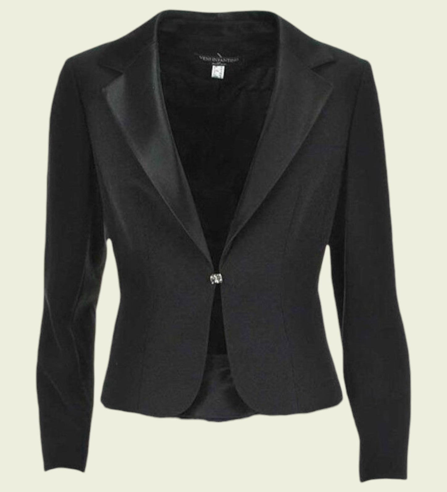 Black blazer on a beige background