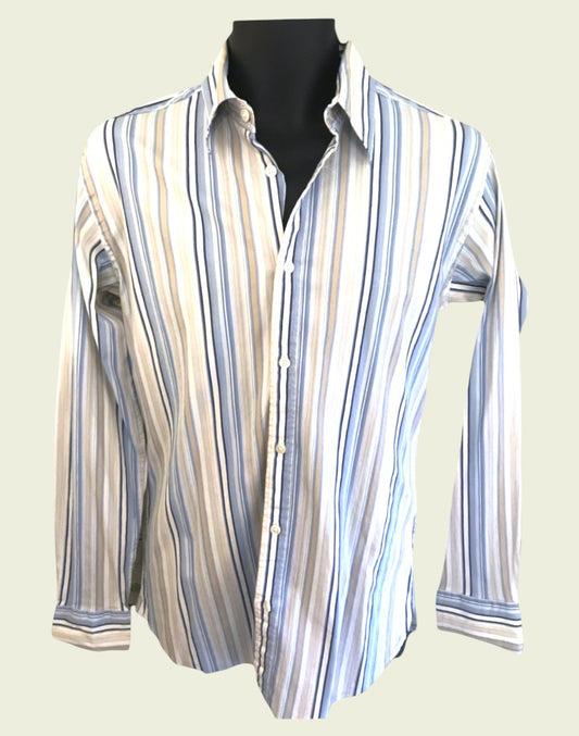 Striped shirt on a mannequin against a light background