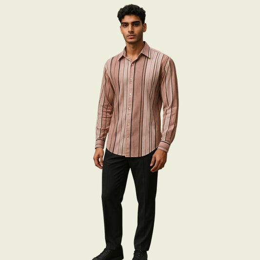Man wearing a striped shirt and black pants on a beige background