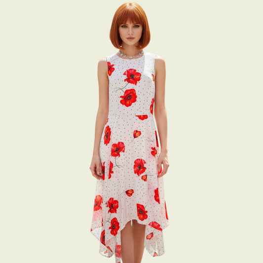 Model wearing a white dress with black polka dots and red poppies on beige background