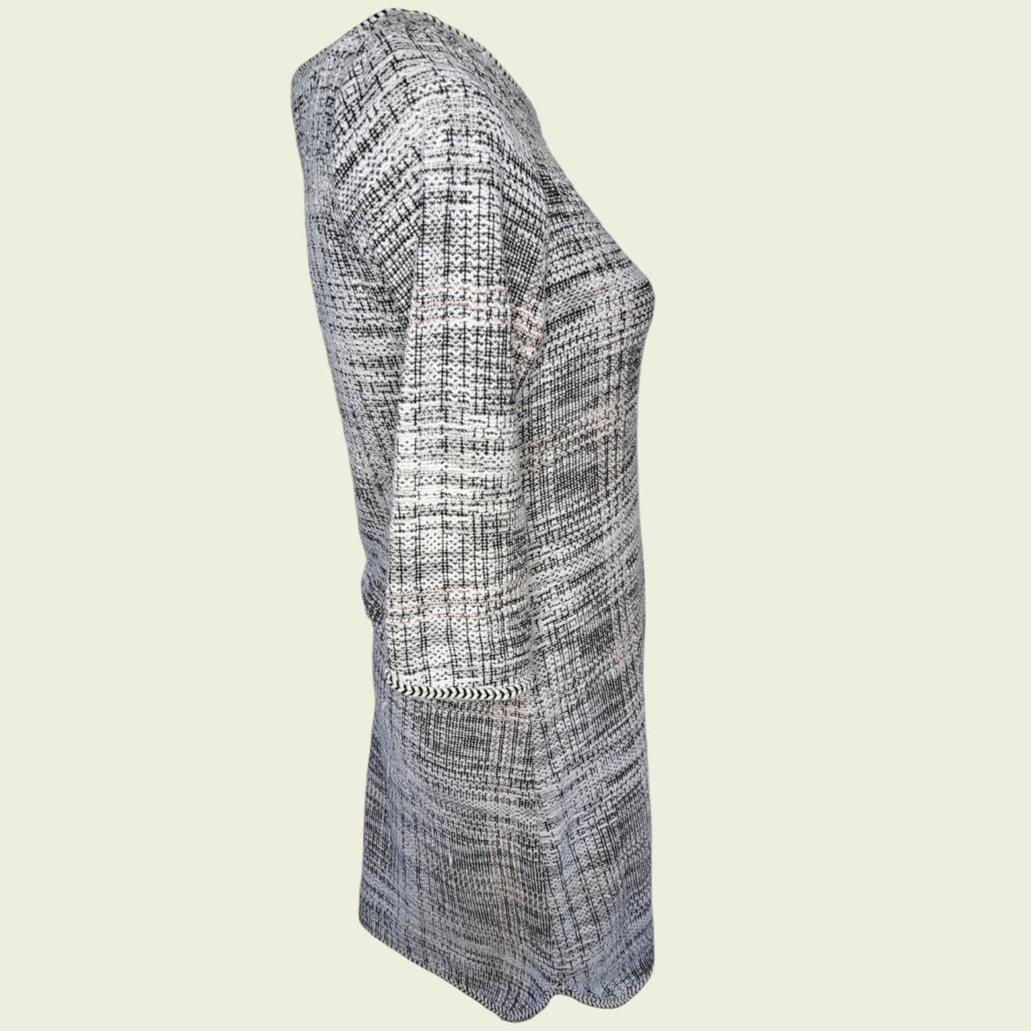 Plaid dress on a beige background