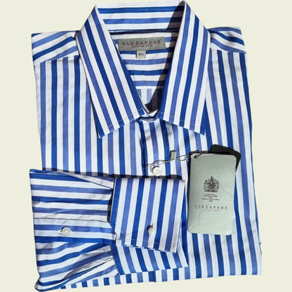 Folded blue and white striped shirt with a visible brand label on a beige background