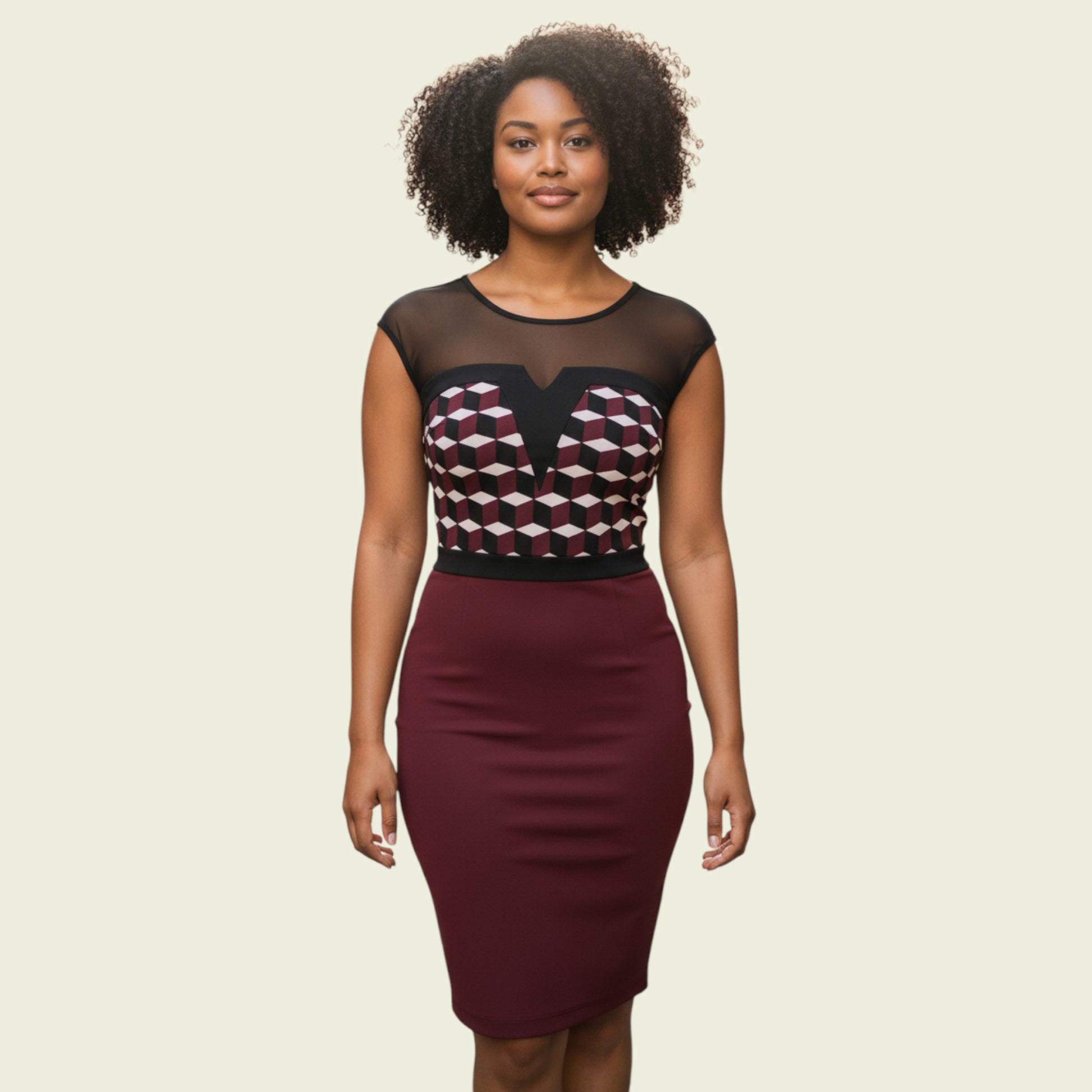 Woman wearing a dress with a geometric pattern on a beige background