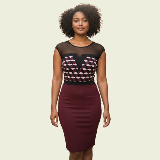 Woman wearing a dress with a geometric pattern on a beige background