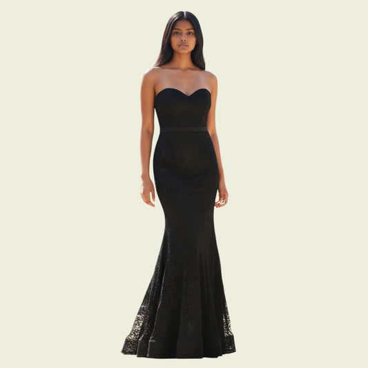 Black strapless gown on a model against a beige background