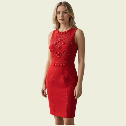 Red dress with intricate design on a beige background