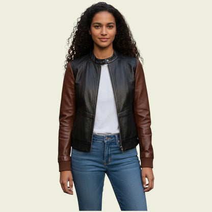 Woman wearing a black and brown leather jacket on a beige background