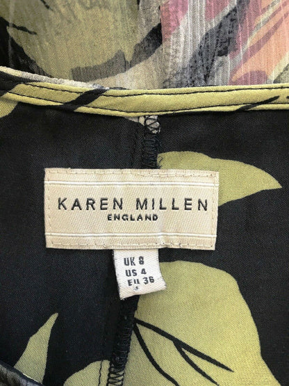 Label on a garment with 'Karen Millen' branding and size information.