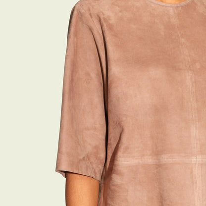 Tan suede top on a beige background