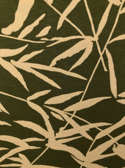 Beige bamboo leaf pattern on a dark green background