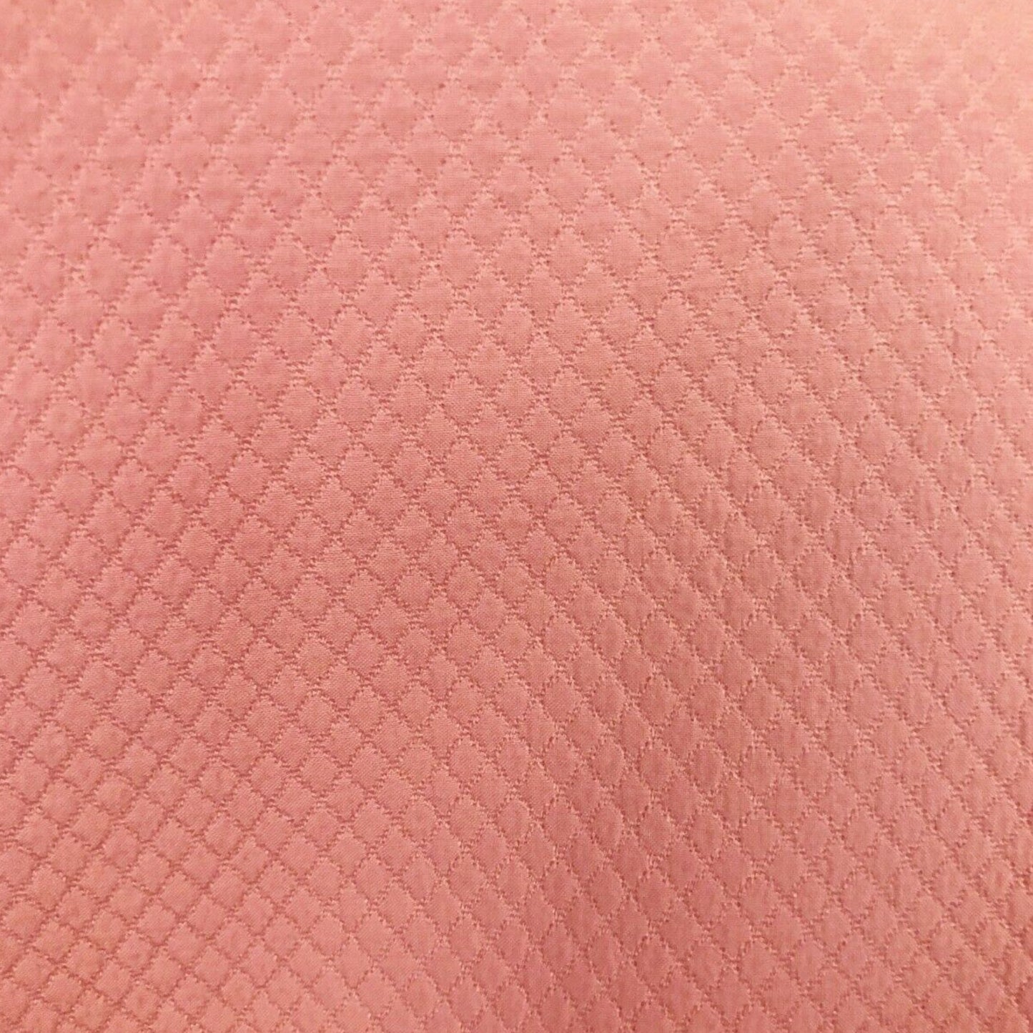 Close-up of pink textured fabric