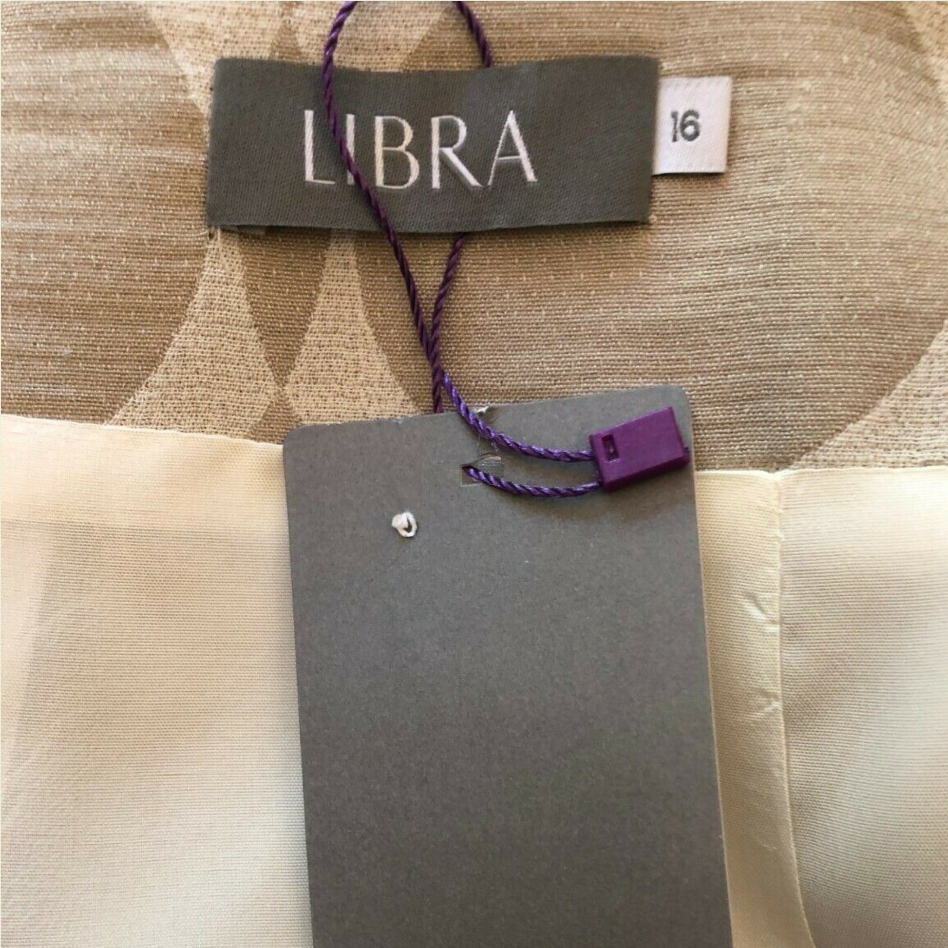 Product with 'Libra' tag on a textured surface