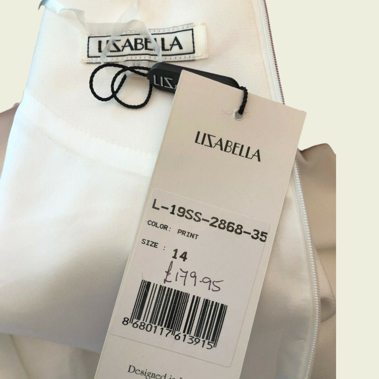 Clothing label showing LIZABELLA and dress size