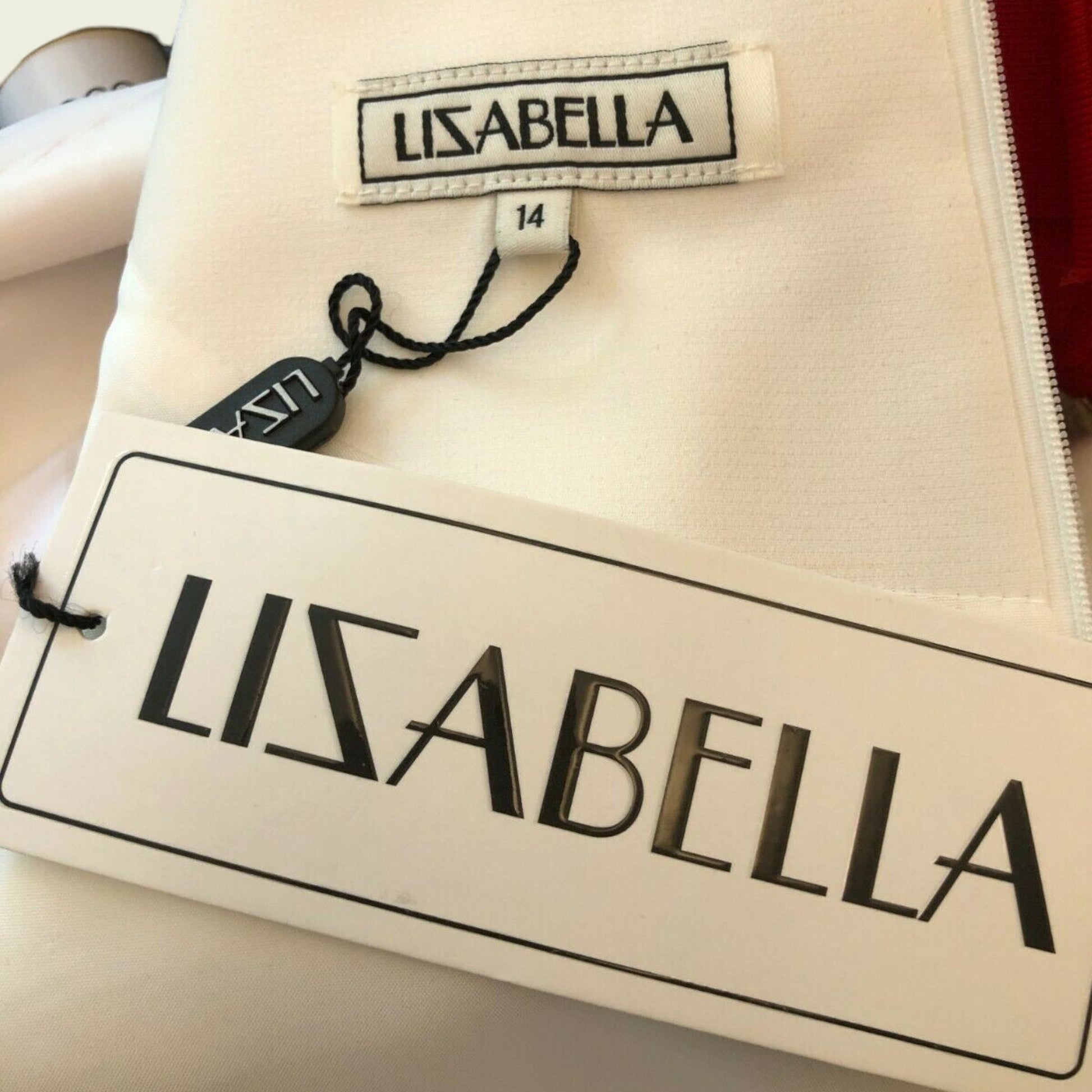 Clothing label showing LIZABELLA and size on white background