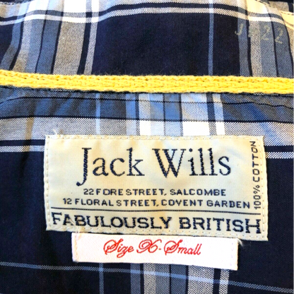 Jack Wills label on a plaid shirt with visible text and branding.