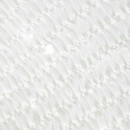 Close-up of a textured white surface
