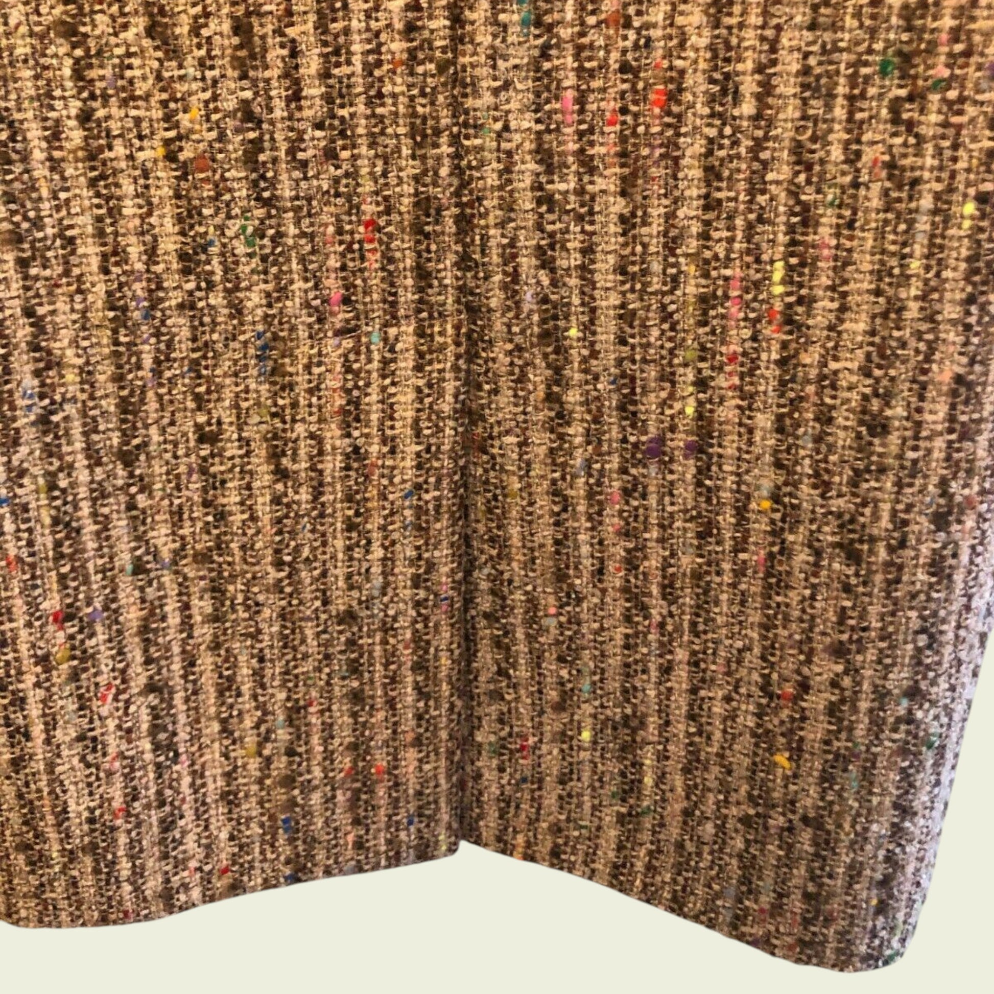 Textured fabric with a multicolor pattern on a white background