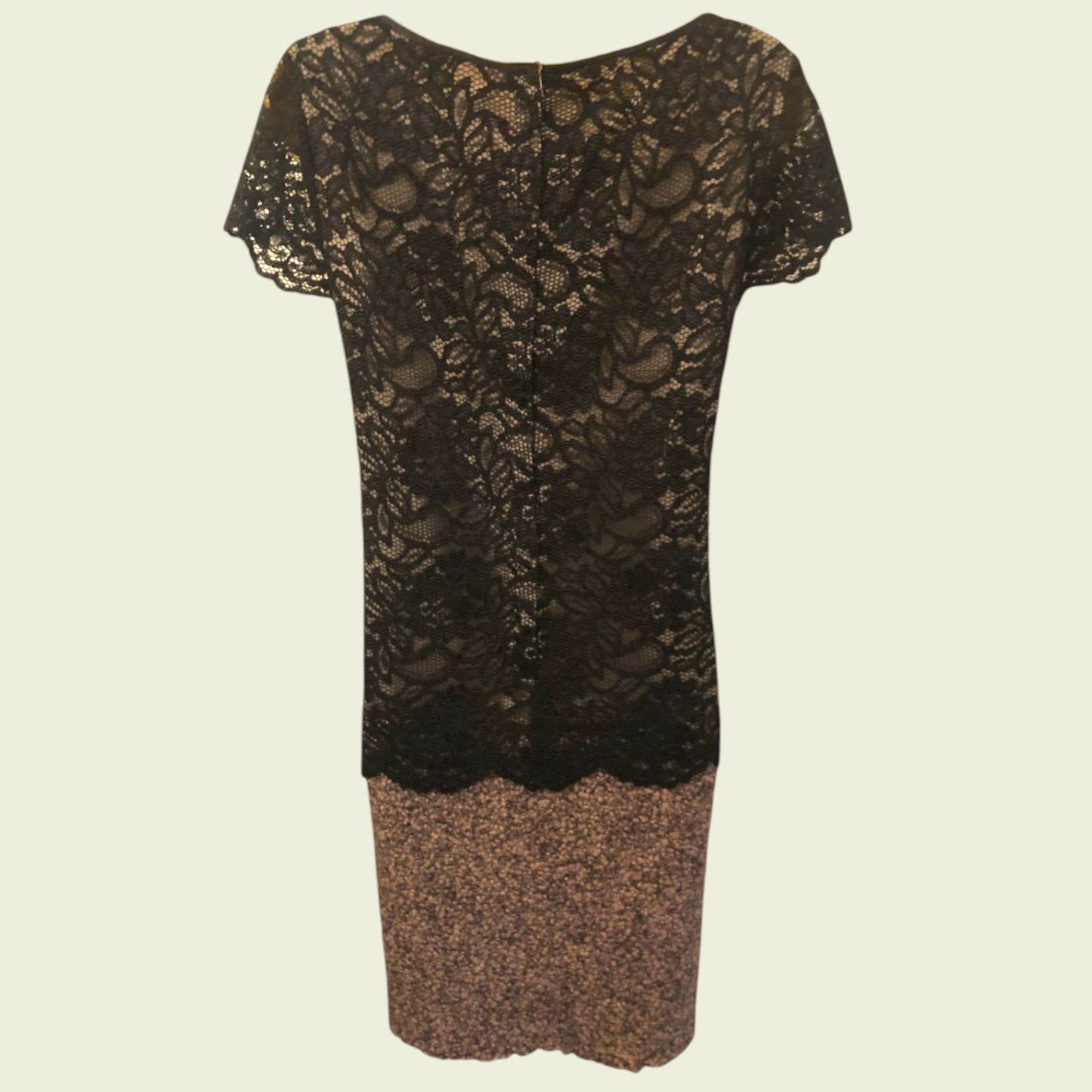 Black lace dress on a beige background