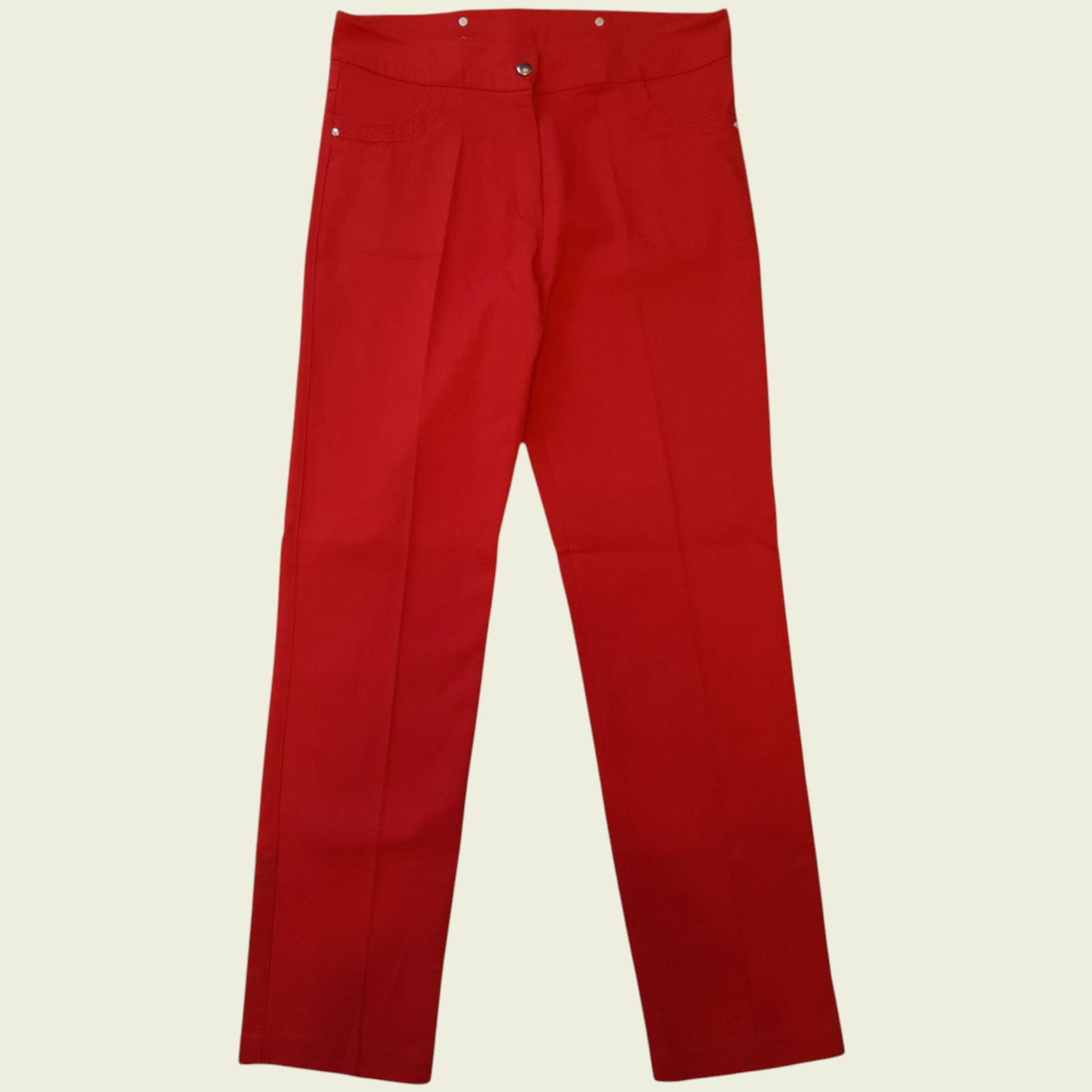 Red pants on a beige background