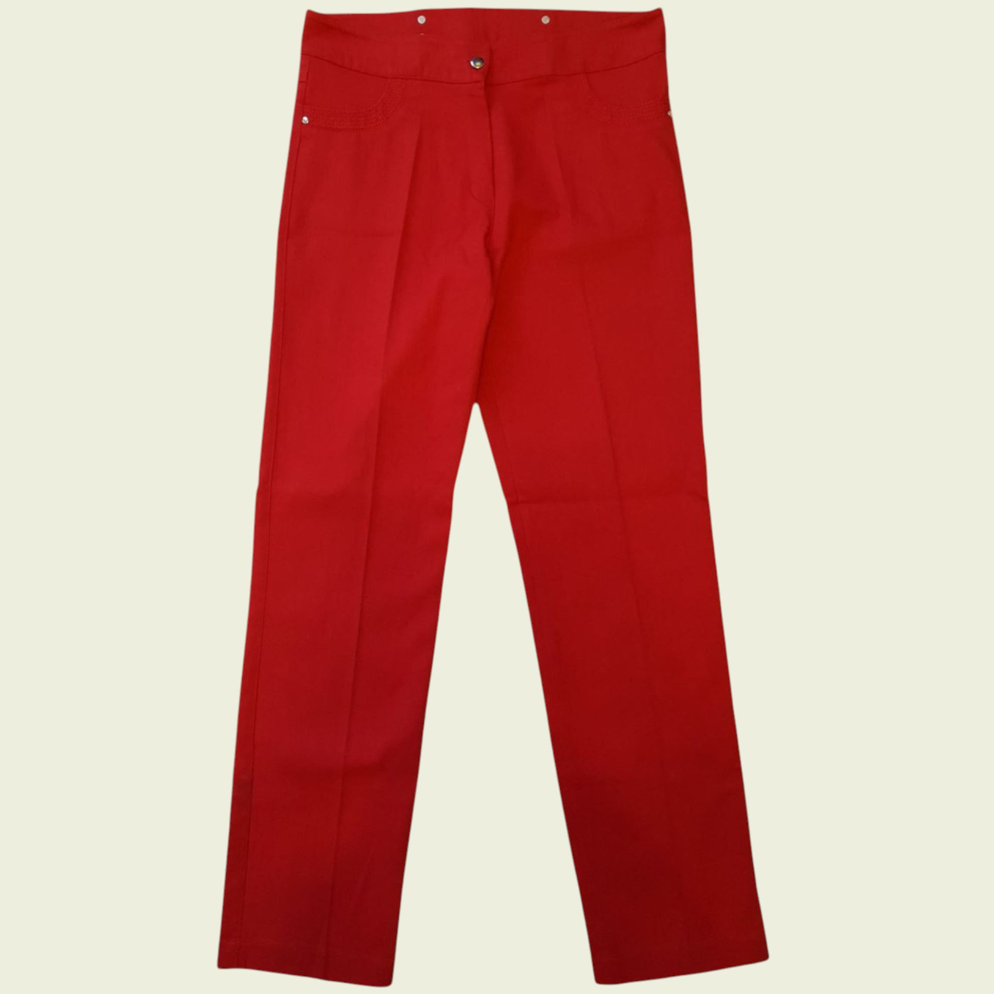 Red pants on a beige background