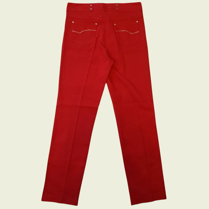 Red pants on a beige background