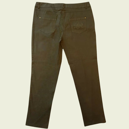Back of khaki jeans on beige background