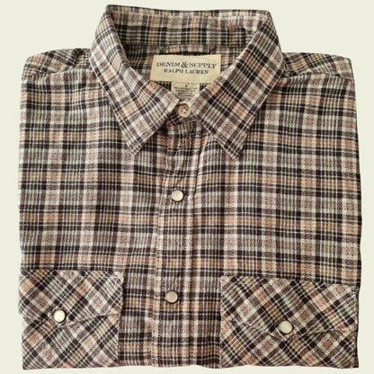 Brown check shirt on a beige background