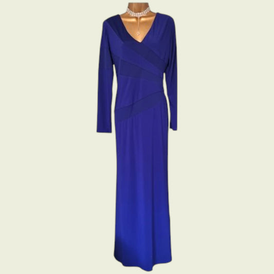 Blue evening gown on a mannequin with a plain background