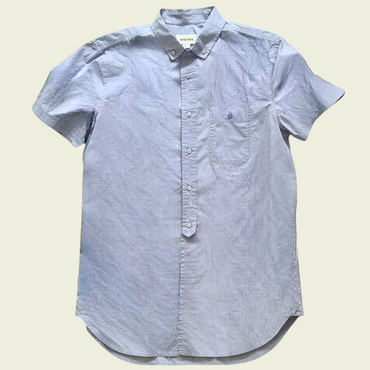 Lilac men's shirt on beige background