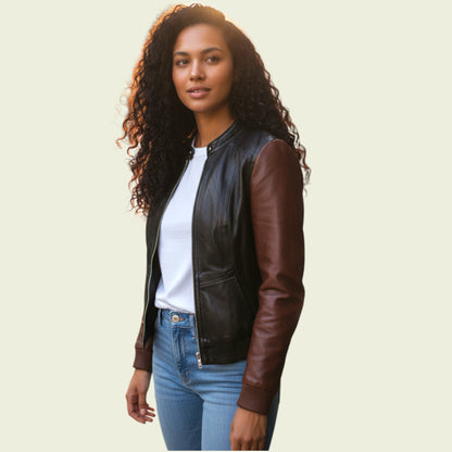 Woman wearing a black and brown leather jacket on a beige background