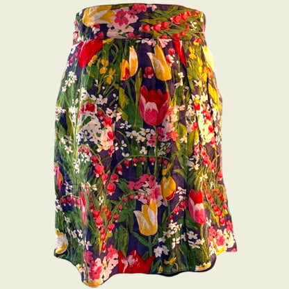Colorful floral skirt on a light gray background