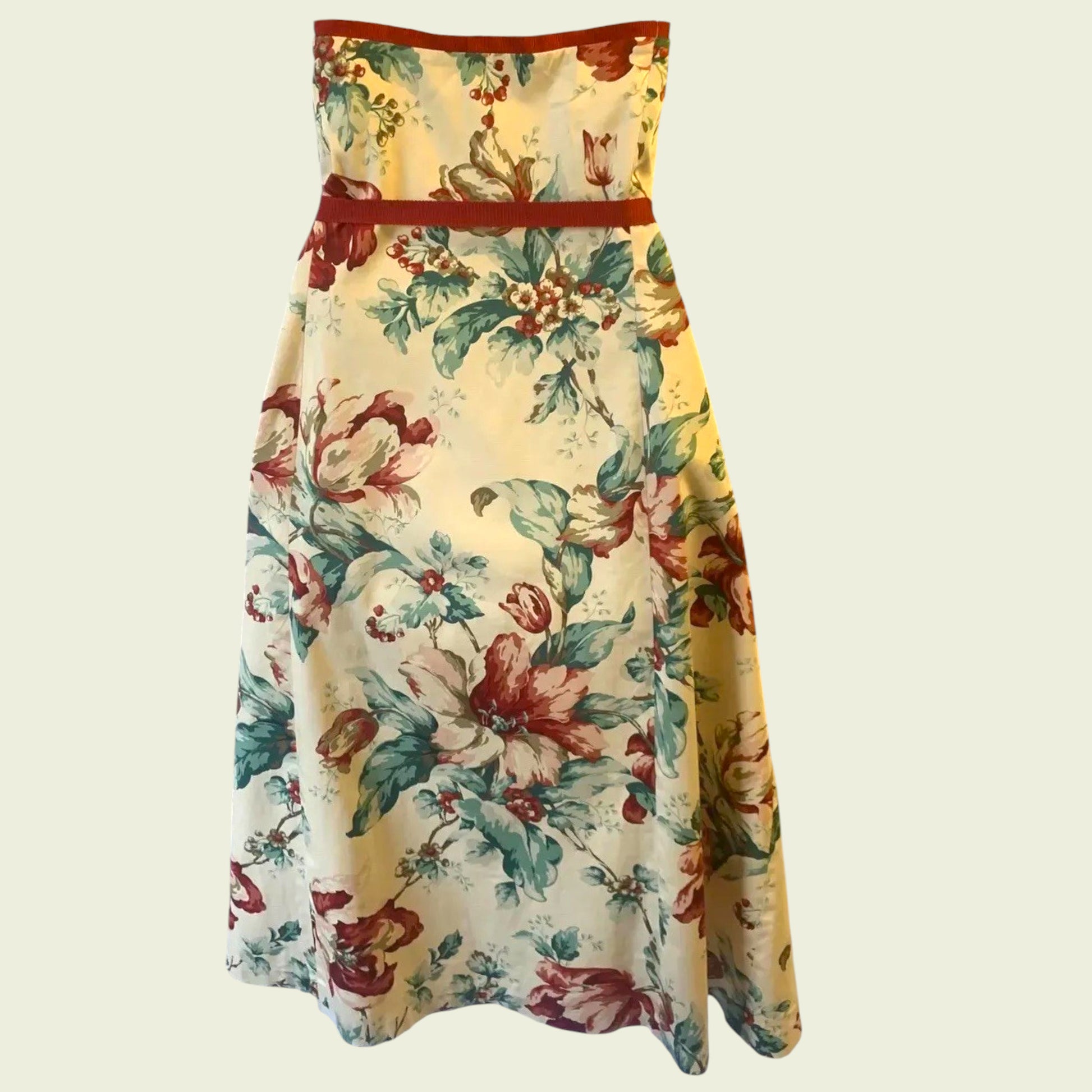 Floral strapless dress on a light beige background