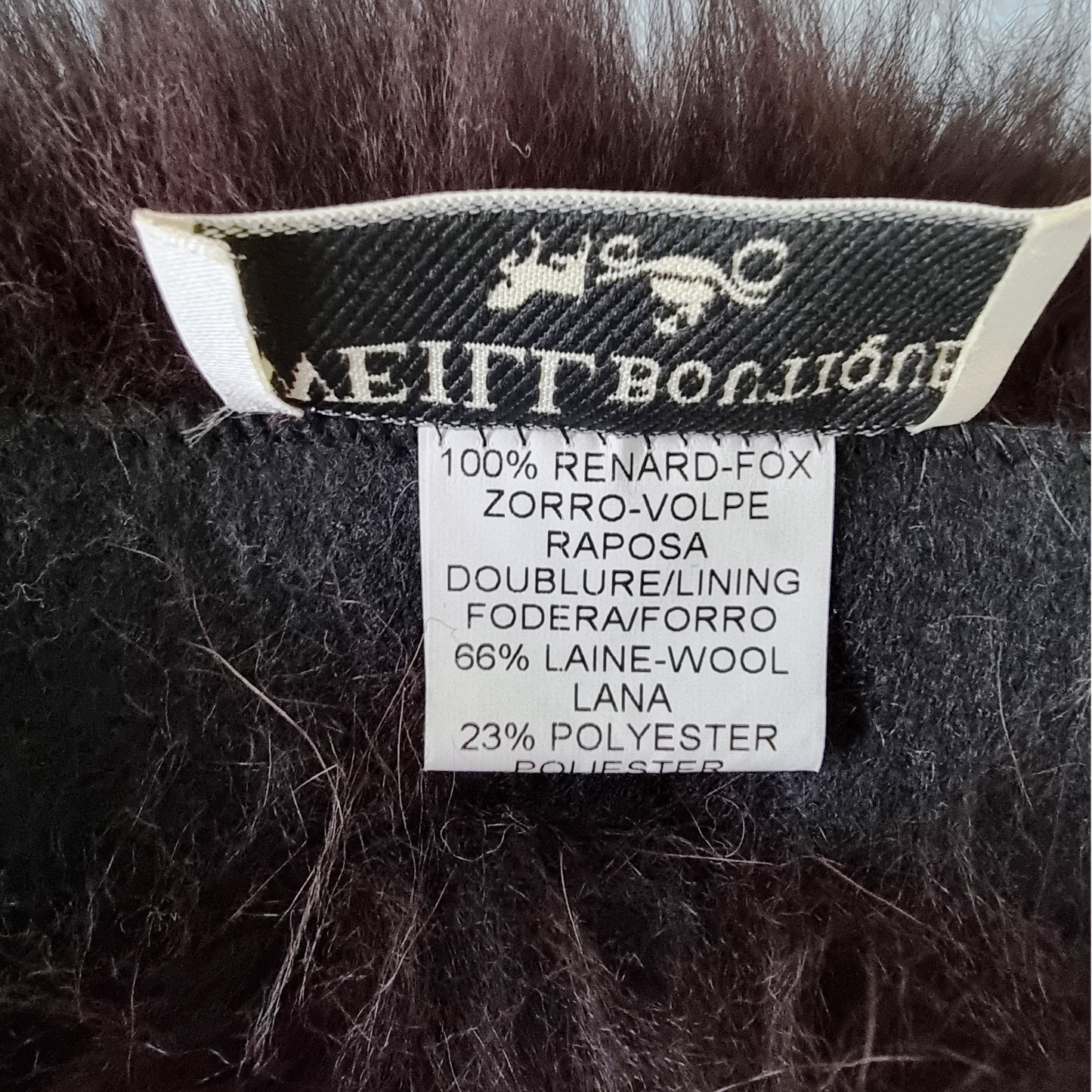 Label showing fabric content on brown background