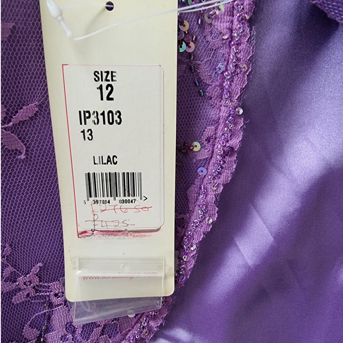 Purple lace fabric with a size tag displaying 'Size 12' and 'IP3103'.