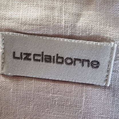 Liz Claiborne label on a textured fabric background