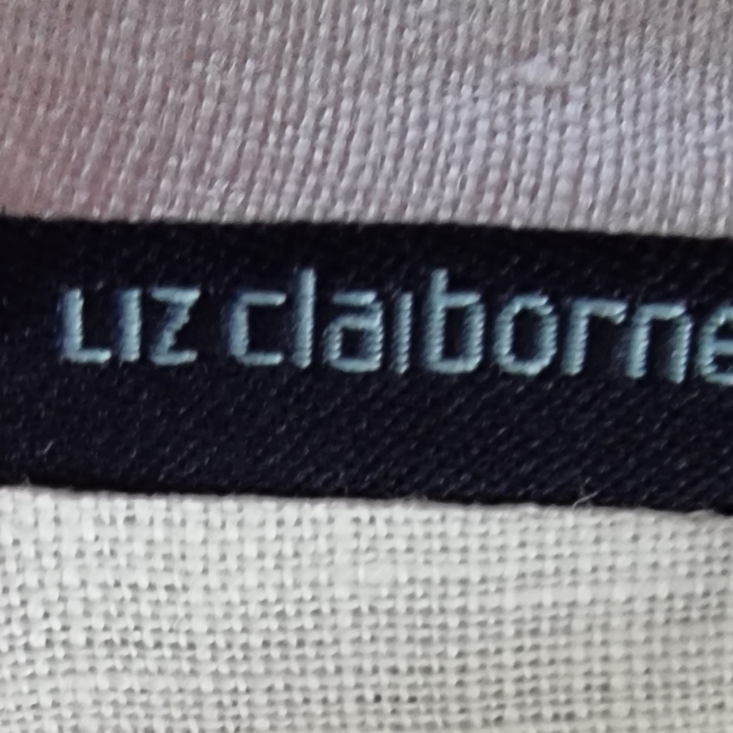 Close-up of a Liz Claiborne label on fabric.