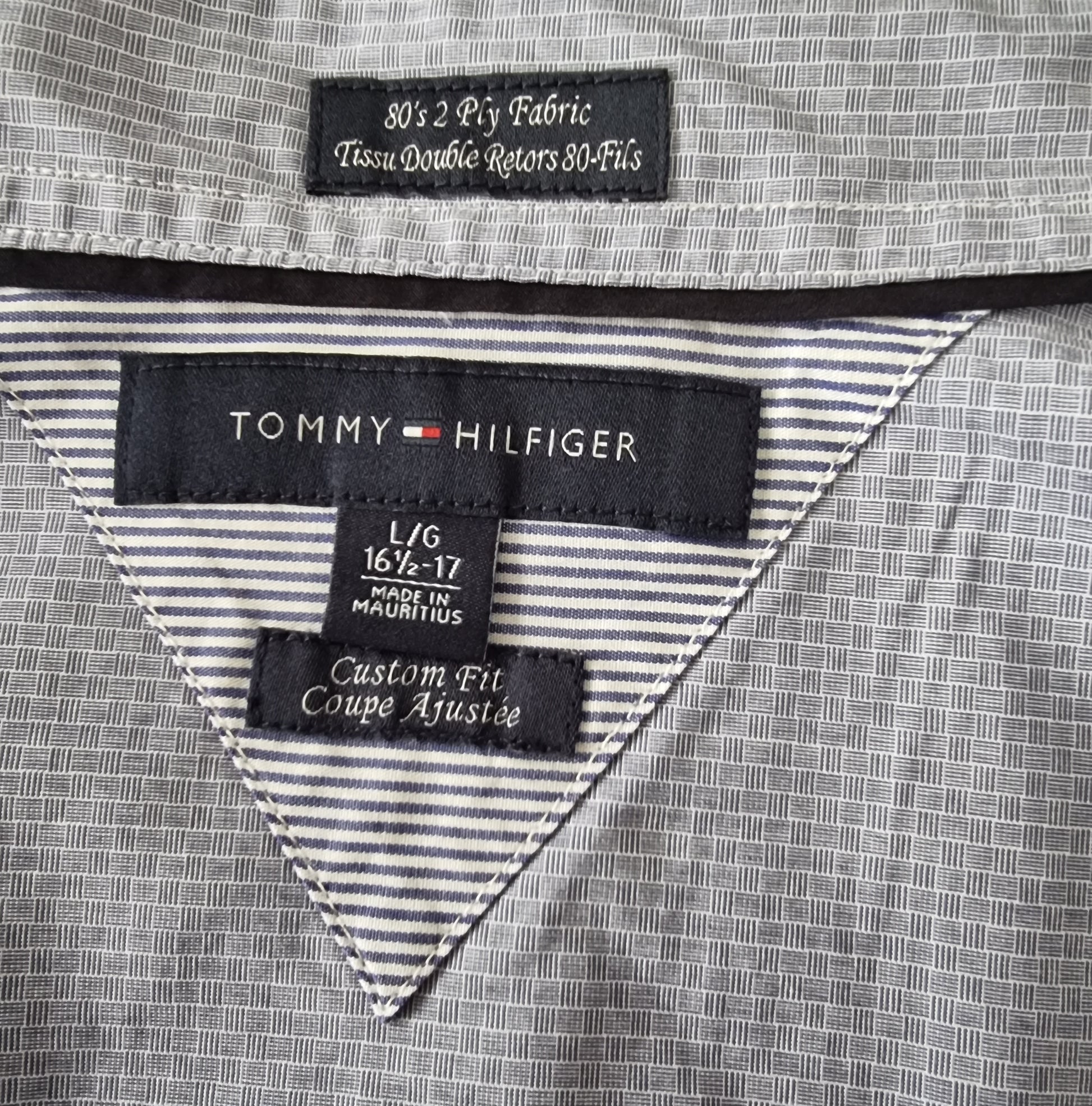 Tommy Hilfiger label on a garment with striped lining