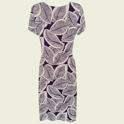 Mannequin wearing a blue and white floral dress on a beige background