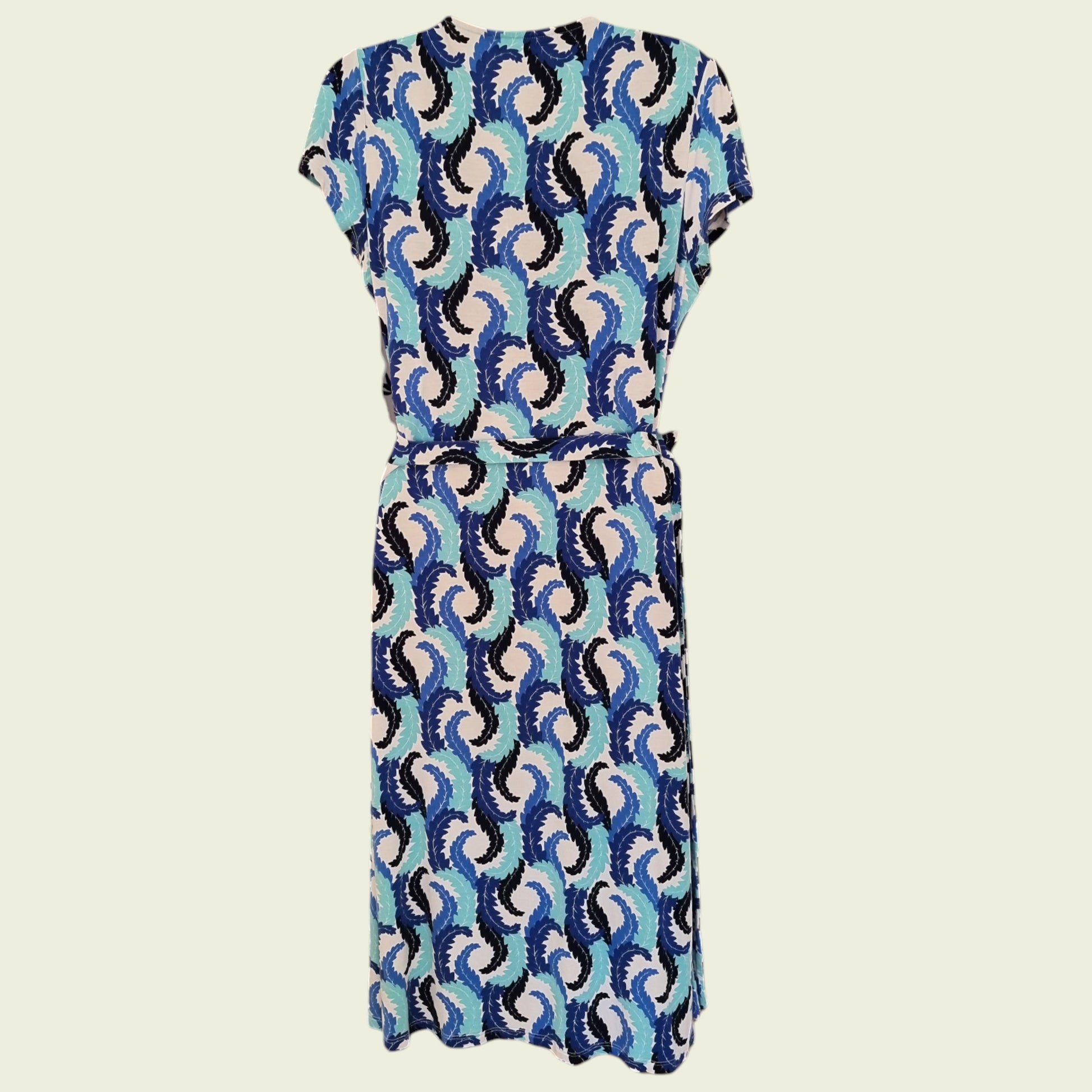 Patterned dress on a beige background