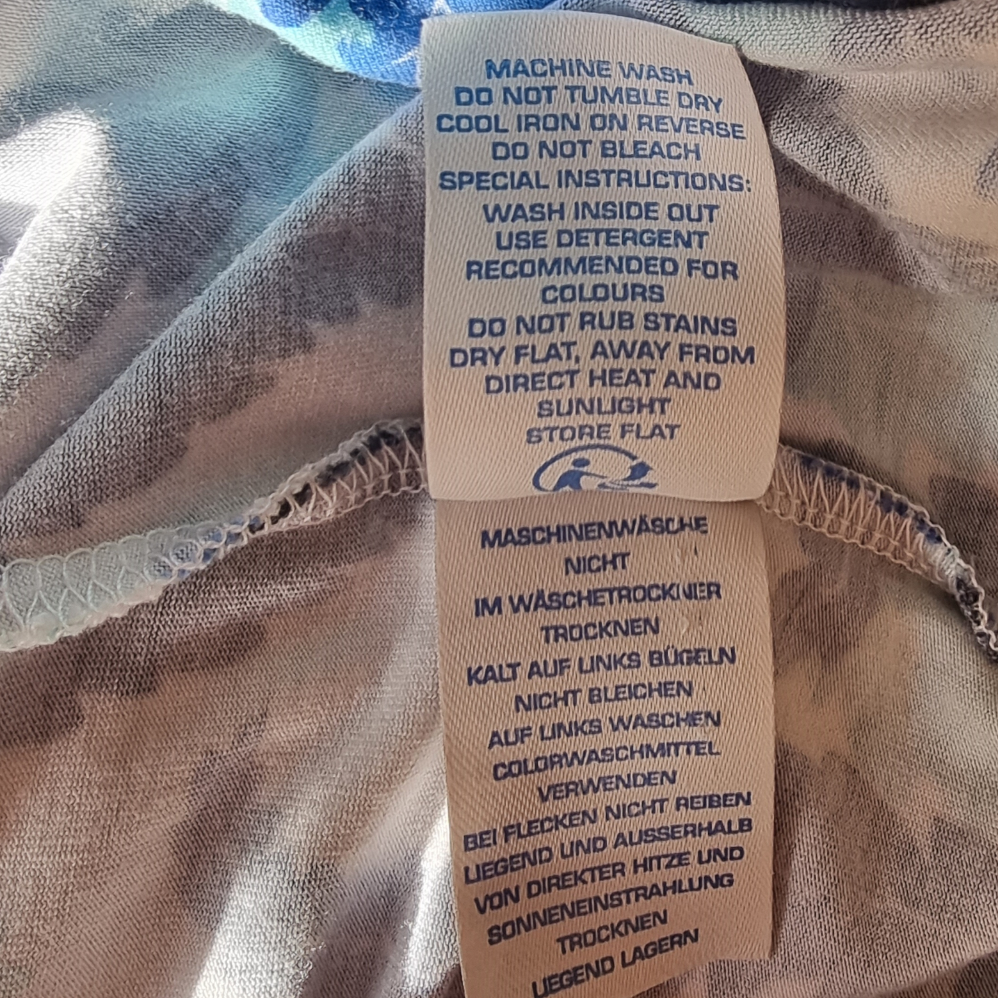 Washing instructions label on a piece of fabric