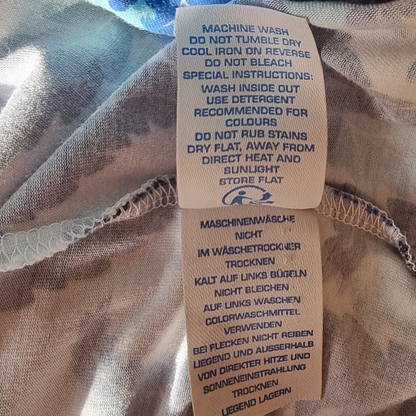 Washing instructions label on a piece of fabric
